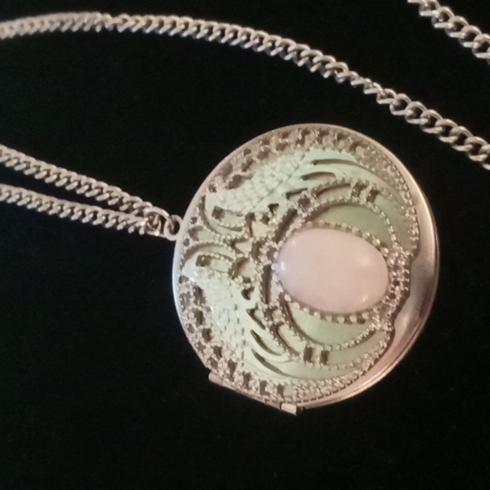 Rose quartz locket fillagree style peacocks Stainless chain 18 inches long